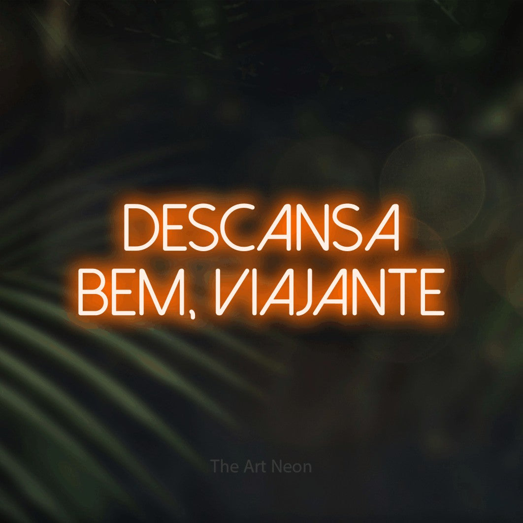 LED neon sign reading “descansa bem, viajante”, arranged in 2 lines.