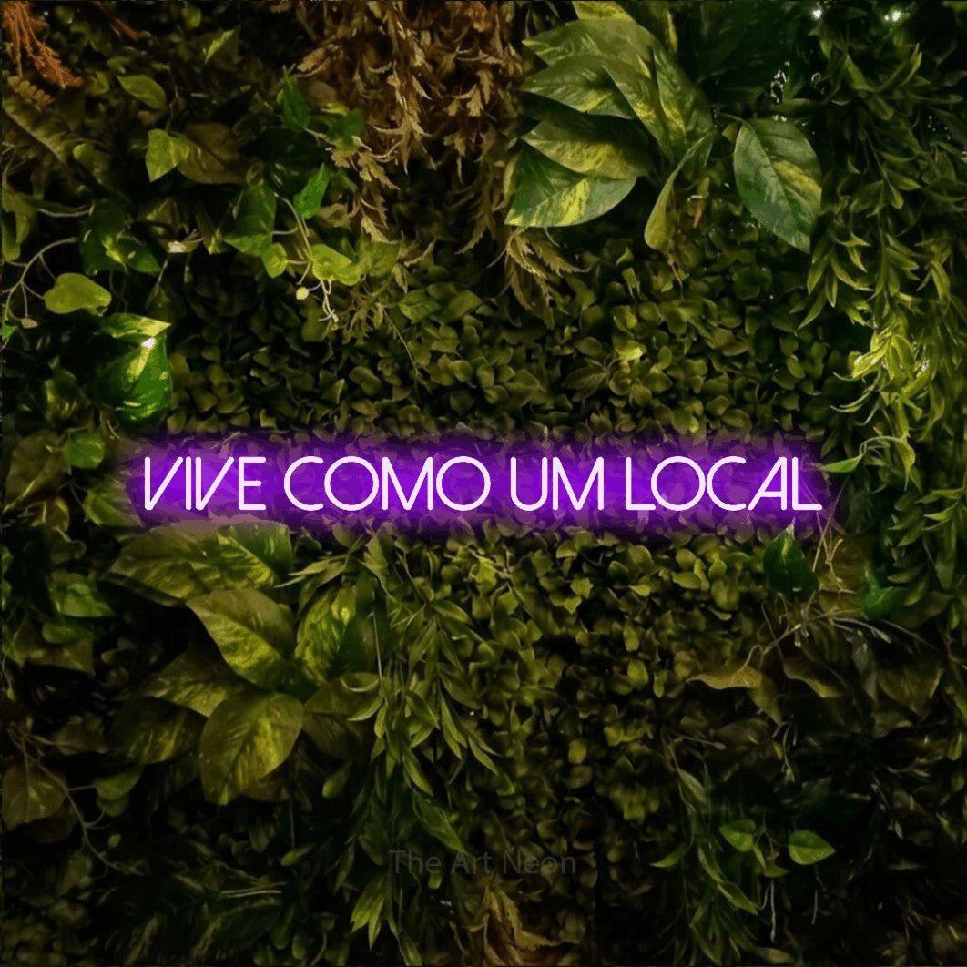 LED neon sign reading “vive como um local”, arranged in a single line.