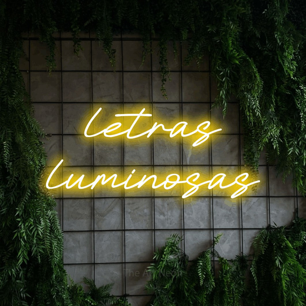LED neon sign reading “letras luminosas”, arranged in 2 lines.