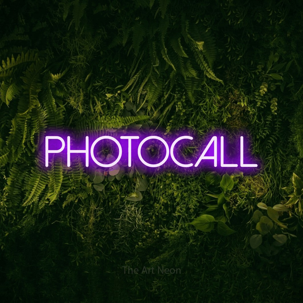 LED neon sign reading “PHOTOCALL”, arranged in a single line.