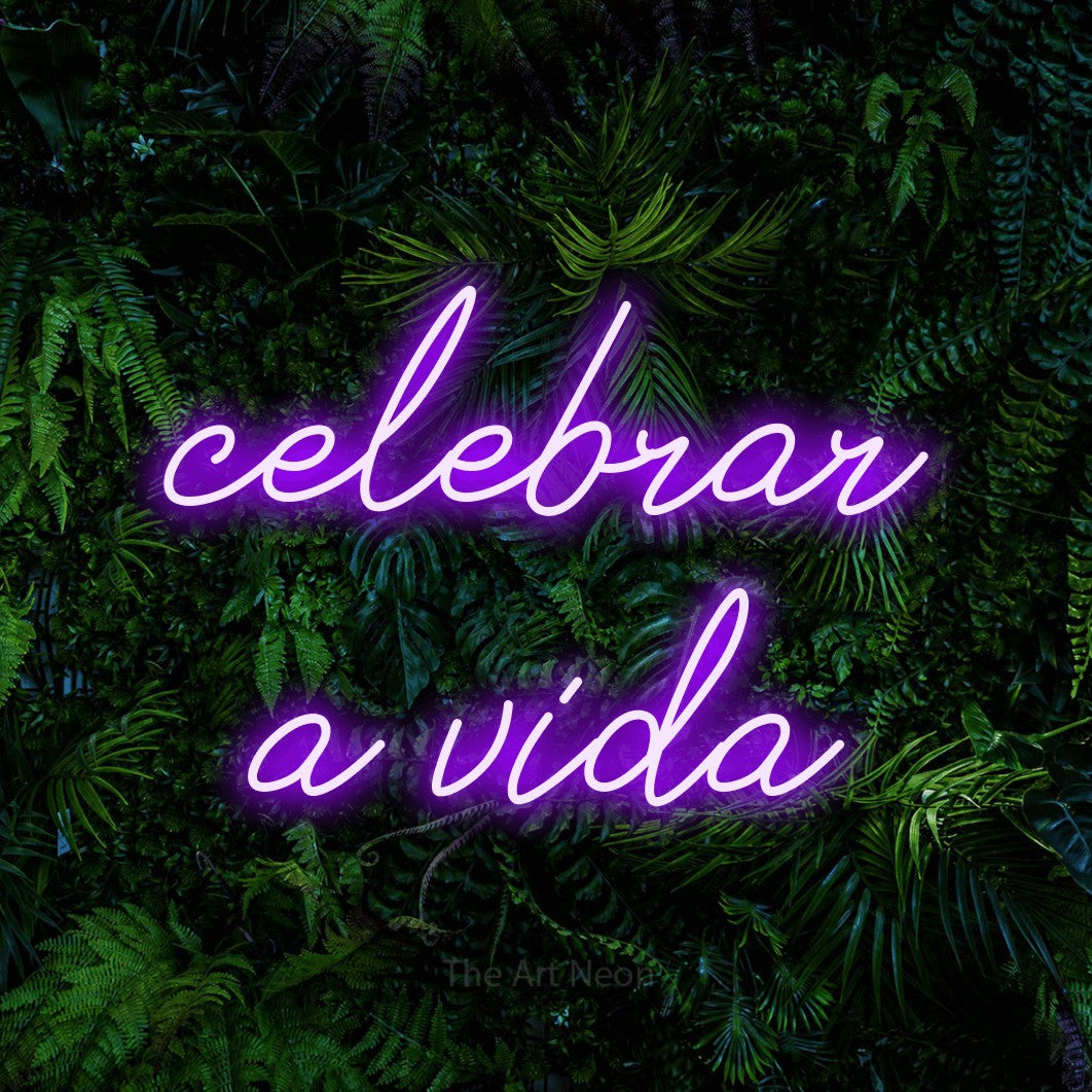 LED neon sign reading “celebrar a vida”, arranged in 2 lines.