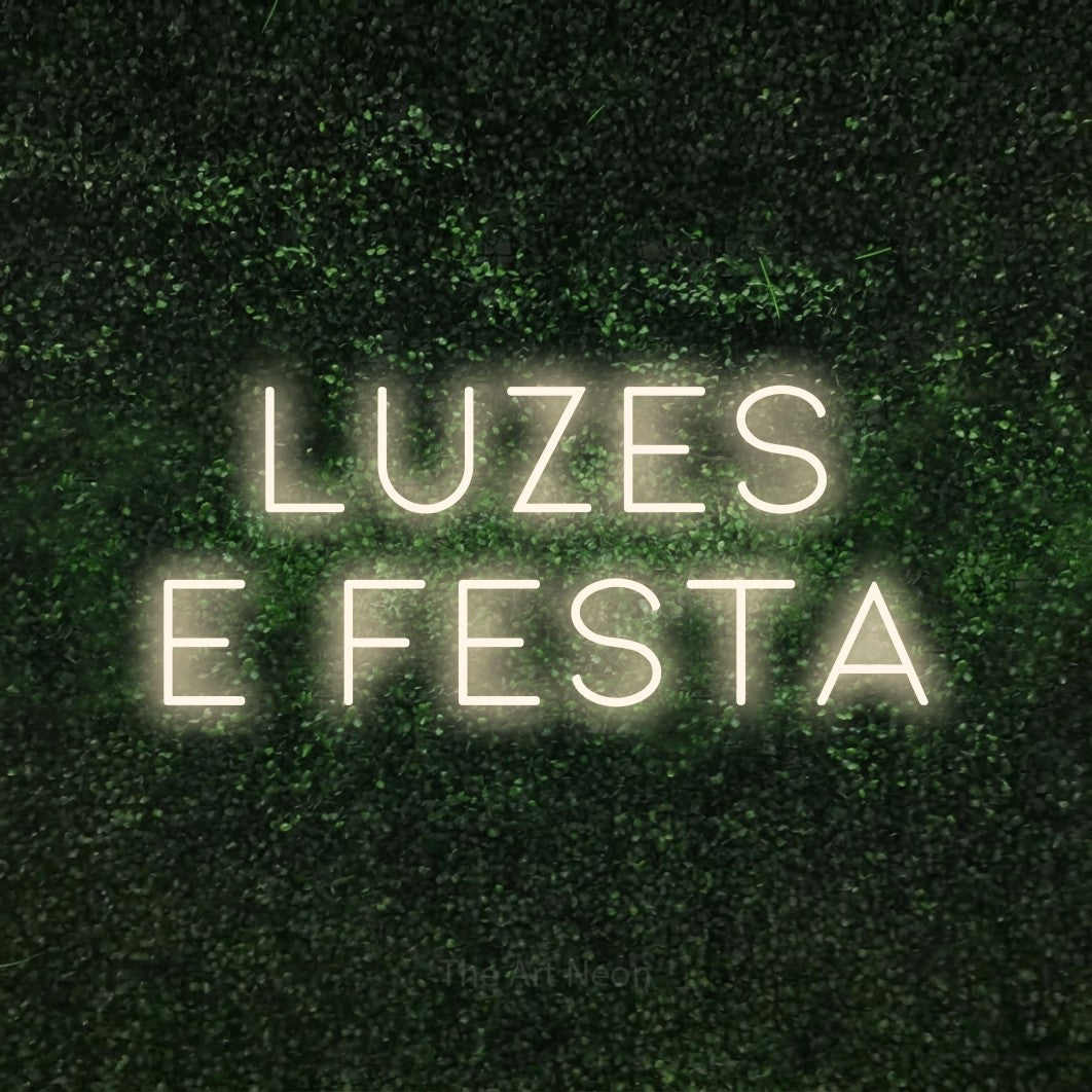 LED neon sign reading “LUZES E FESTA”, arranged in 2 lines.