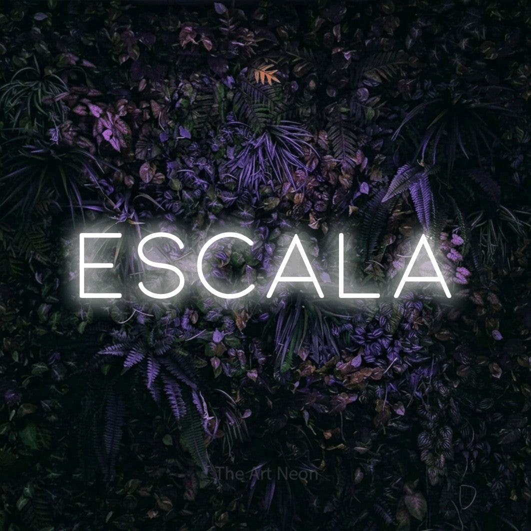 LED neon sign reading “Escala”, arranged in a single line.