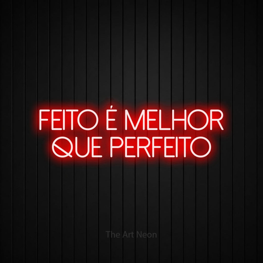 LED neon sign reading “Feito é melhor que perfeito”, arranged in 2 lines.