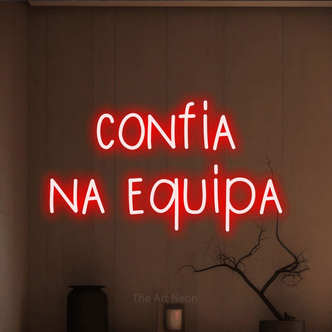 LED neon sign reading “confia na equipa”, arranged in 2 lines.