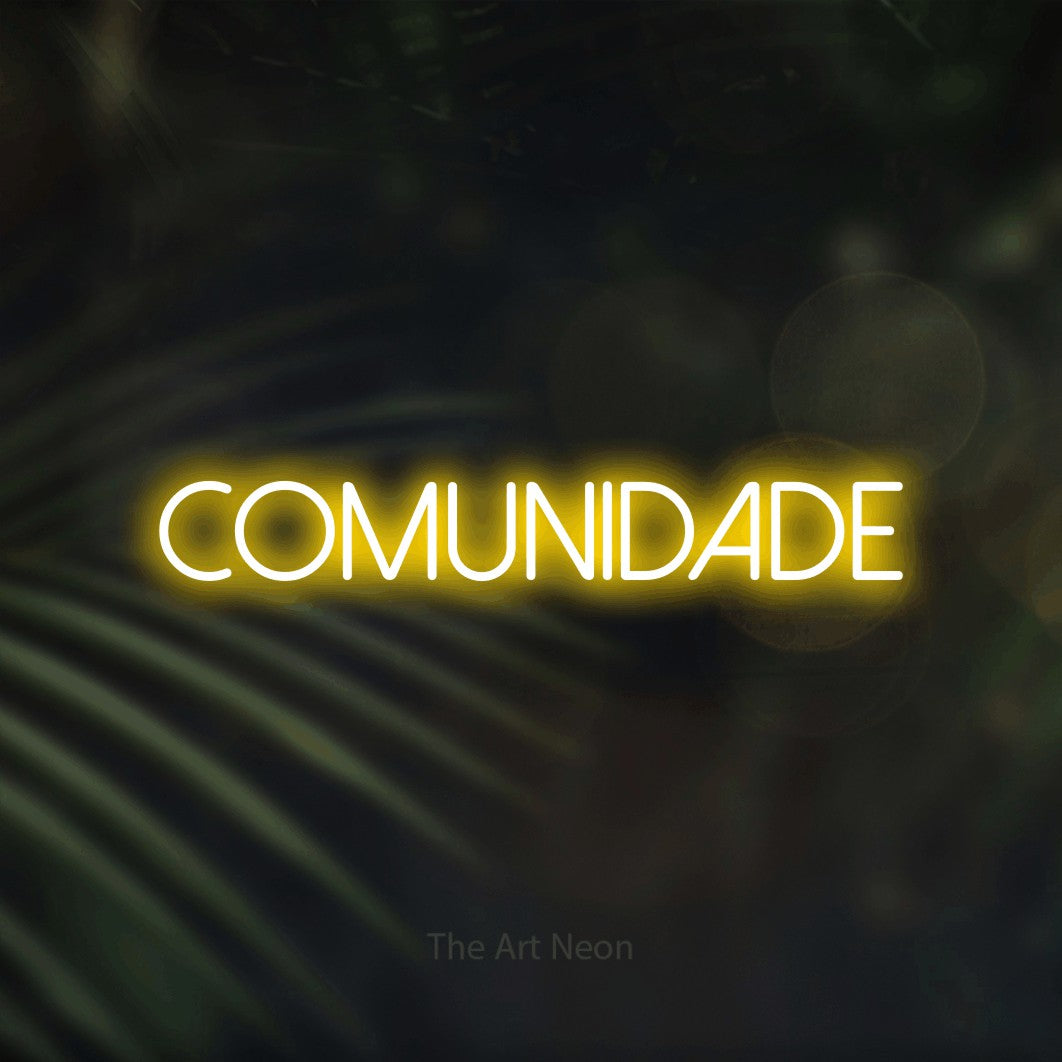 LED neon sign reading “COMUNIDADE”, arranged in a single line.