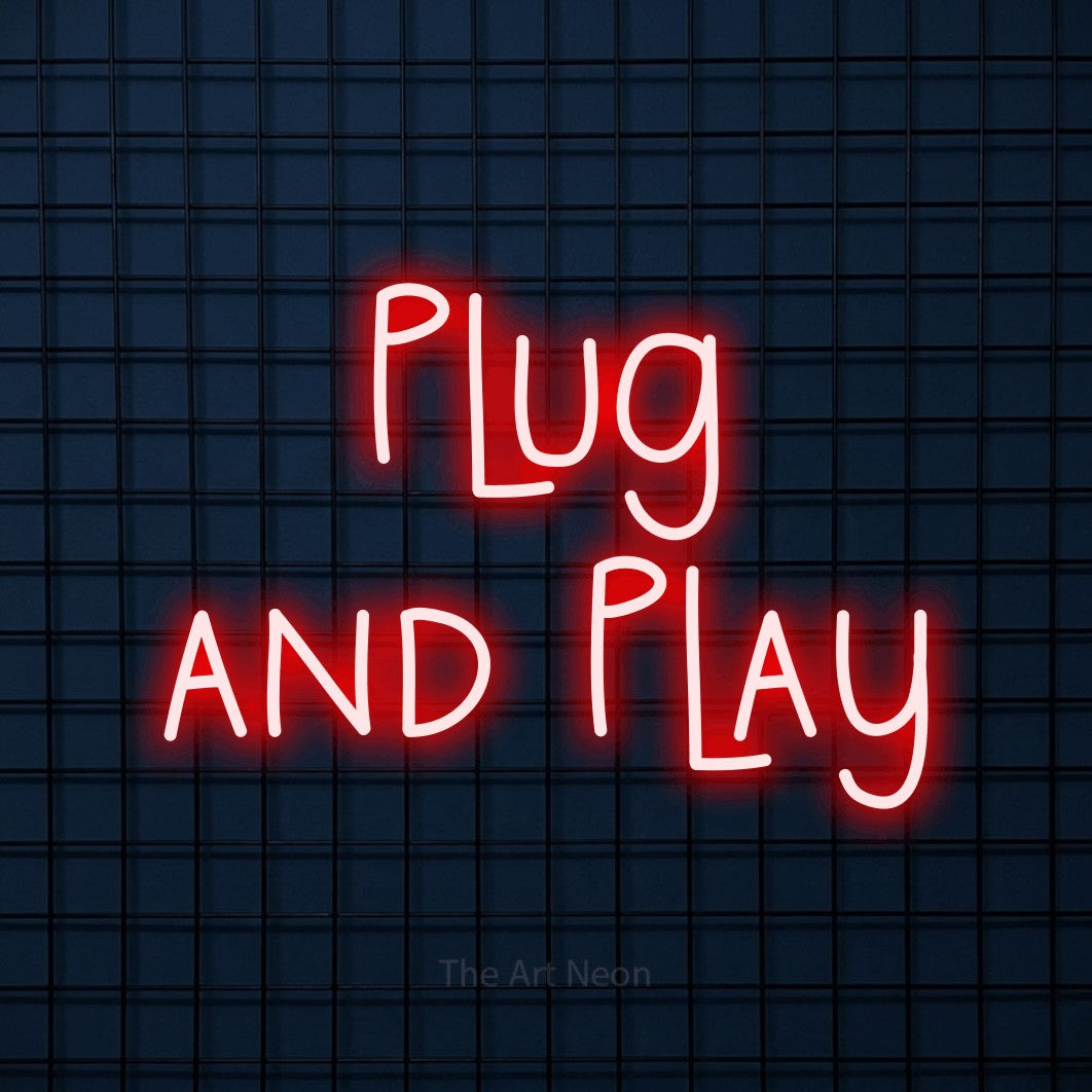 LED neon sign reading “Plug and Play”, arranged in 2 lines.