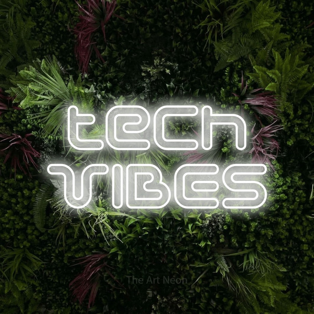 LED neon sign reading “tech VIBES”, arranged in 2 lines.