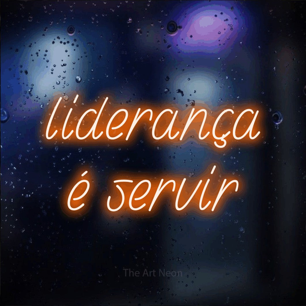 LED neon sign reading “liderança é servir”, arranged in 2 lines.
