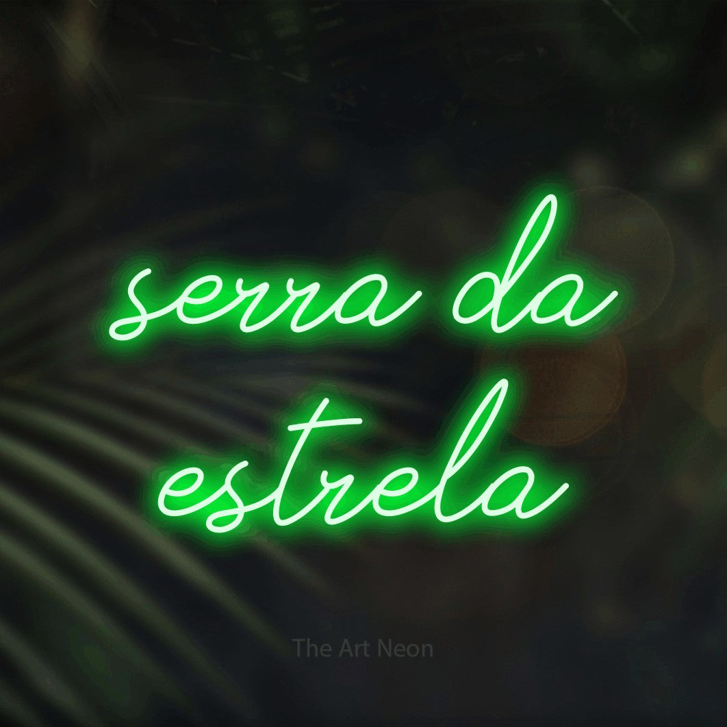 LED neon sign reading “serra da estrela”, arranged in 2 lines.