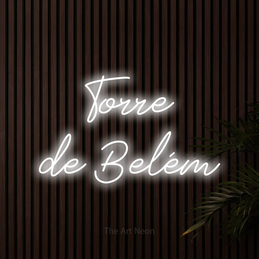LED neon sign reading “Torre de Belém”, arranged in 2 lines.