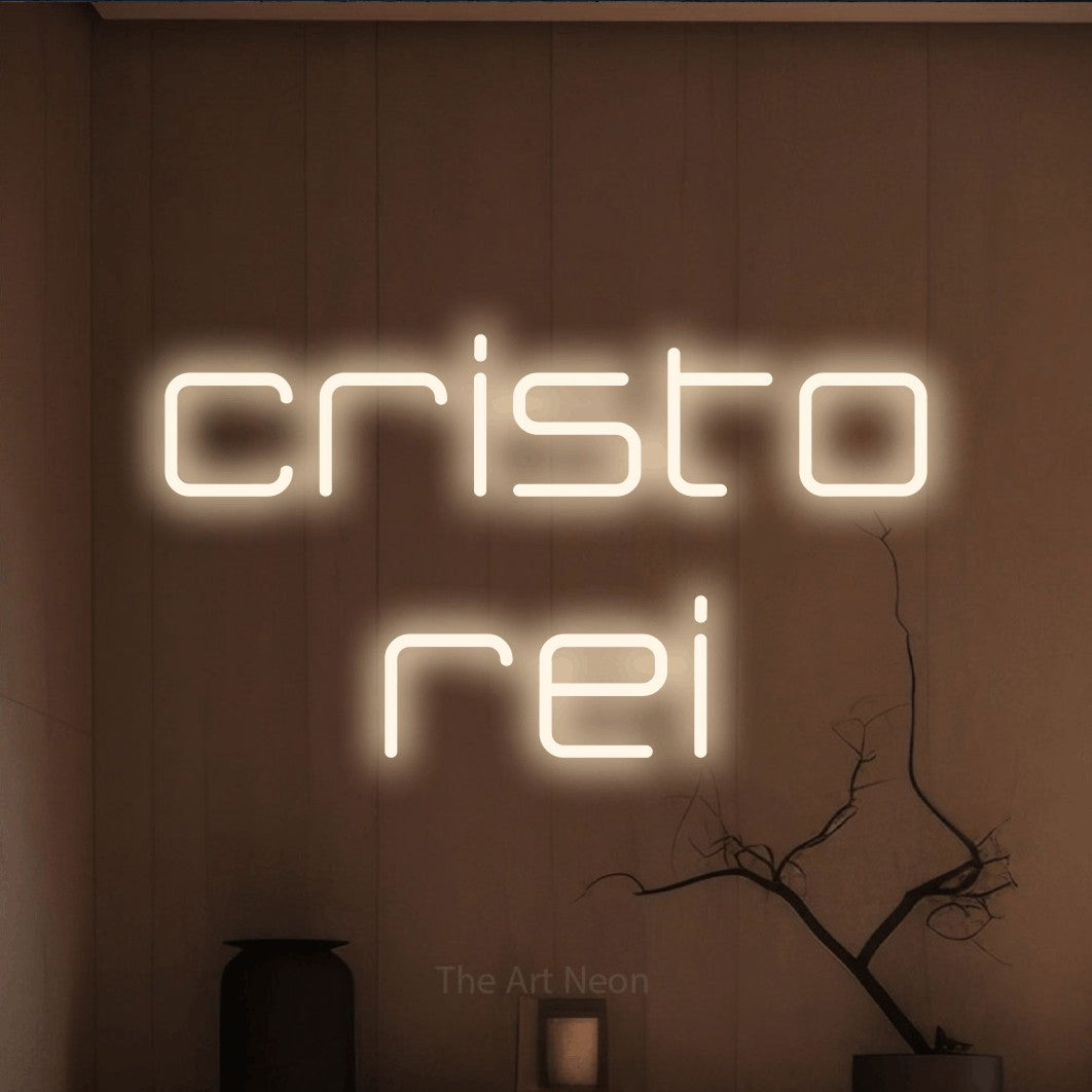 LED neon sign reading “cristo rei”, arranged in 2 lines.