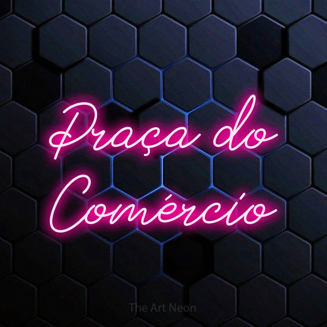 LED neon sign reading “Praça do Comércio”, arranged in 2 lines.