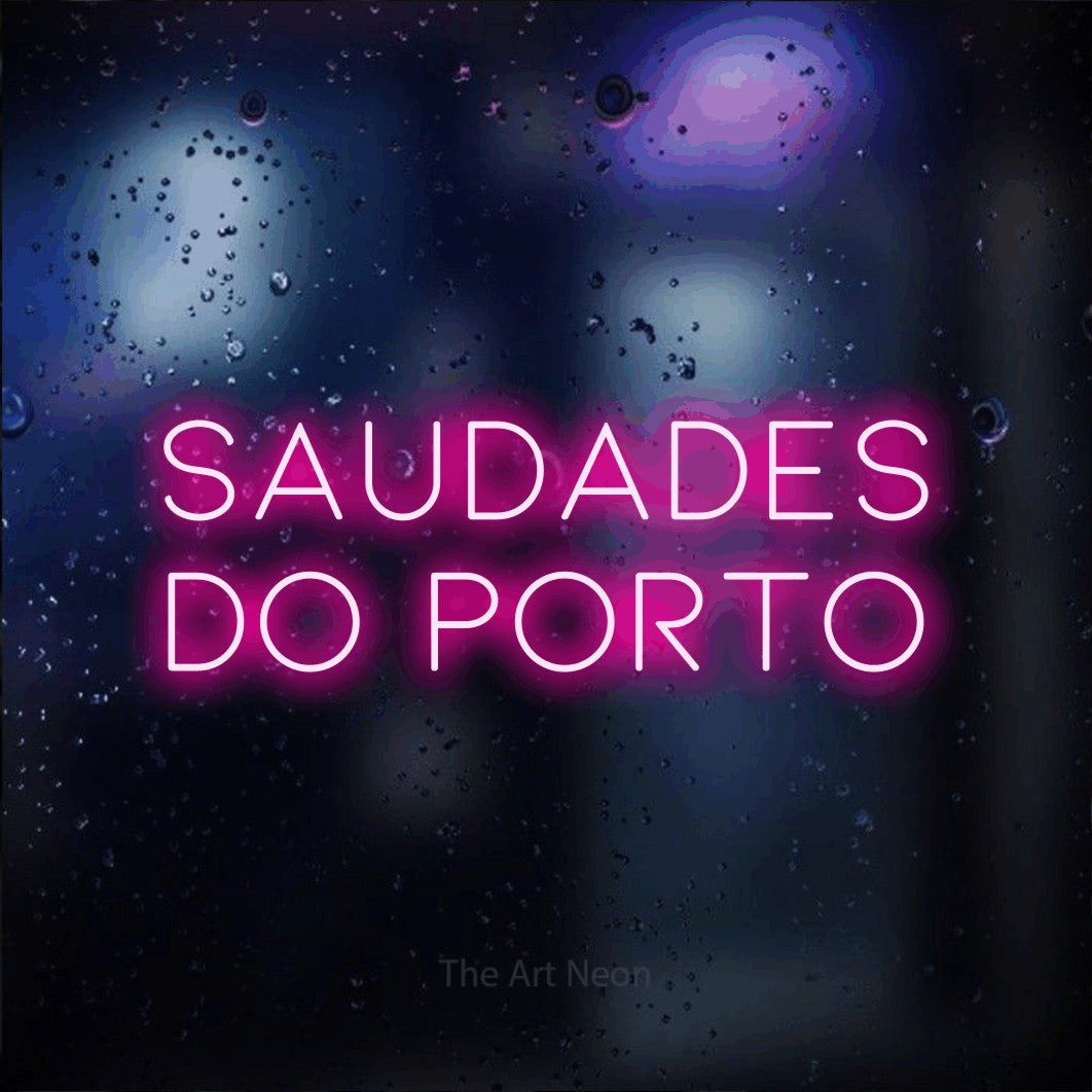 LED neon sign reading “saudades do porto”, arranged in 2 lines.