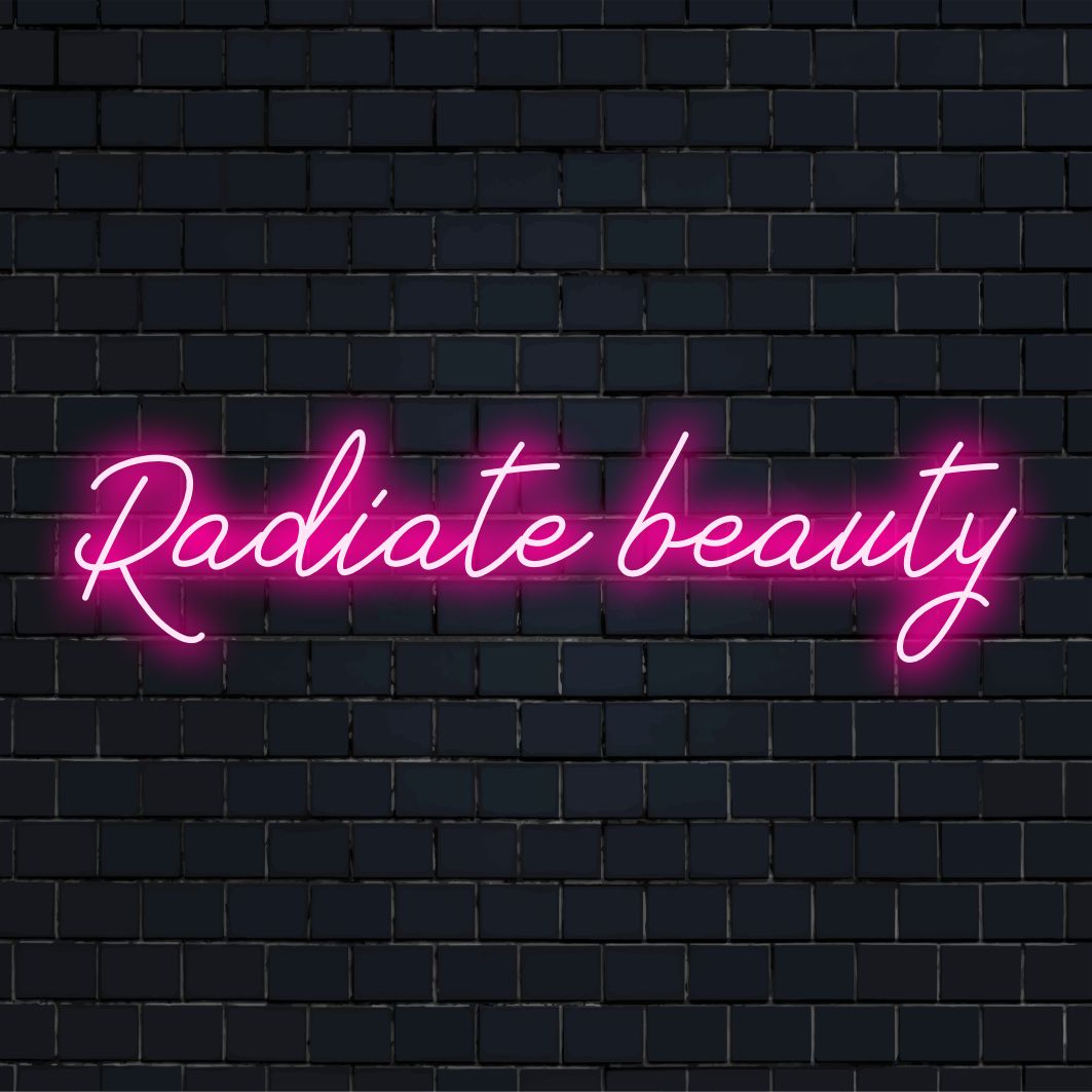 Placa de LED neon personalizada feita pela marca The Art Neon com a frase Radiate Beauty em cores neon vibrantes.