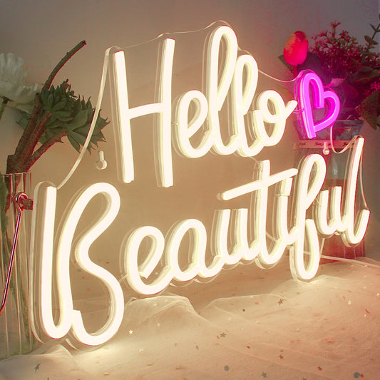 The image features a vibrant, eye-catching "Hello Beautiful" LED neon sign.