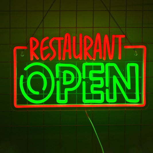 The image displays a vibrant, illuminated LED neon sign featuring the word "OPEN" in bold, uppercase letters.
