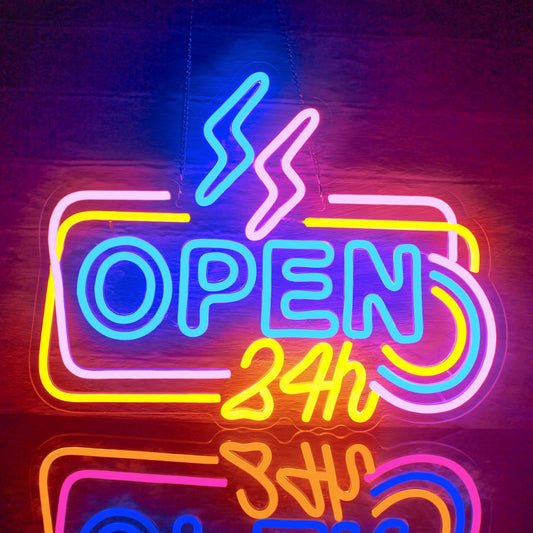The image features a vibrant LED neon sign displaying the message "24 Hours Open" in bright, glowing letters.