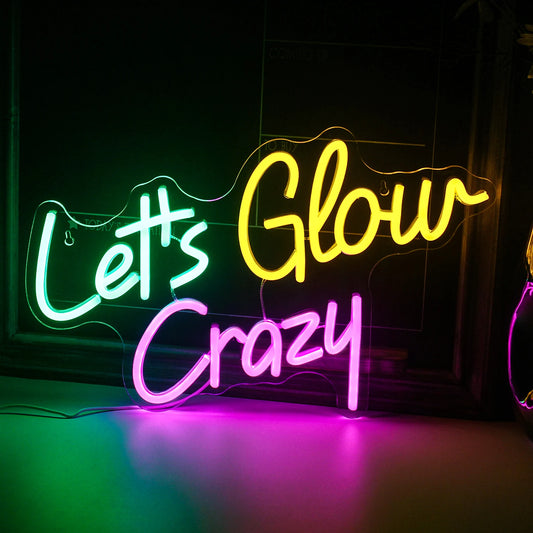The image features a vibrant, handmade LED neon sign that reads "Let's Glow Crazy.