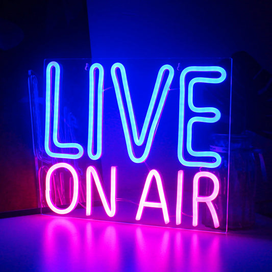 The image features a vibrant LED neon sign that reads "Live On Air" in bold, captivating letters.