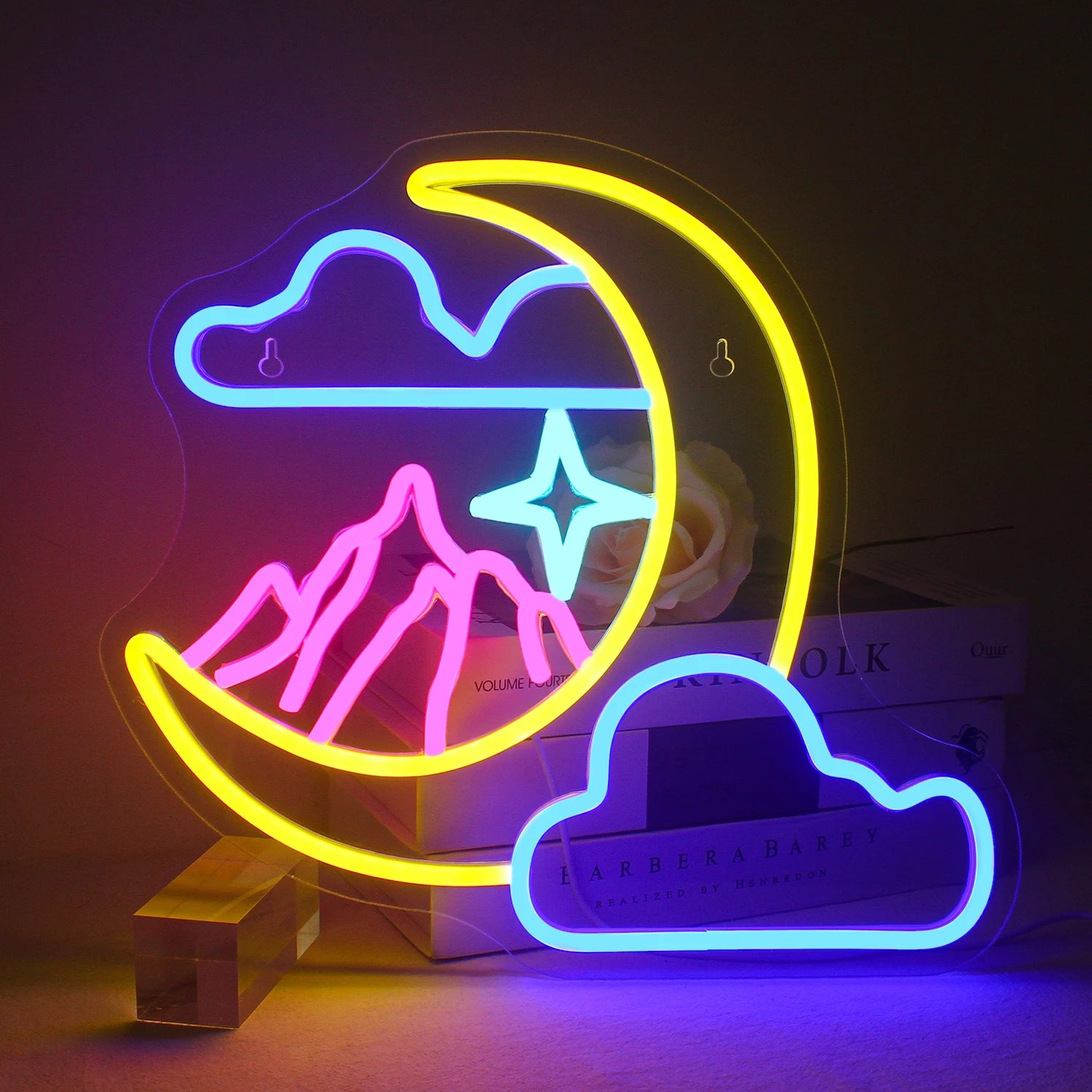 The image showcases a whimsical LED neon sign shaped like a crescent moon resting on a fluffy cloud.