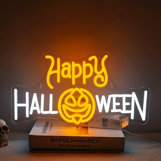A vibrant LED neon sign displaying the words "Happy Halloween" in a festive font.
