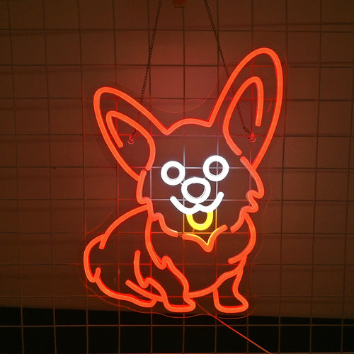 Uma placa de LED neon vermelha brilhante e vívida representando a silhueta de um cão Corgi.