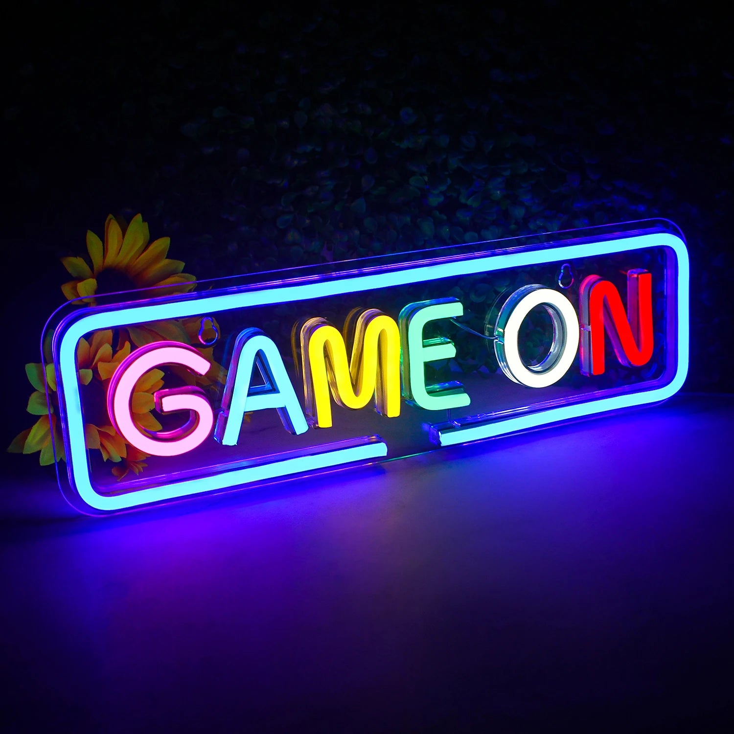 The image features a vibrant "Game On" LED neon sign, glowing with a bright, eye-catching hue.