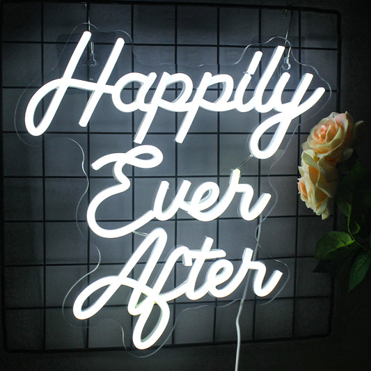 The image displays a glowing LED neon sign that reads "Happily Ever After" in elegant, cursive handwriting.