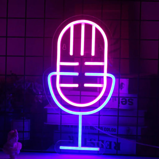 A vibrant LED neon sign shaped like a classic microphone.