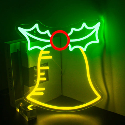 A imagem mostra uma placa de LED neon feita à mão exibindo a mensagem festiva "Bell Merry Christmas.