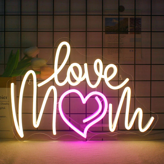 The image displays a vibrant LED neon sign featuring the phrase "Love Mom" in cursive.