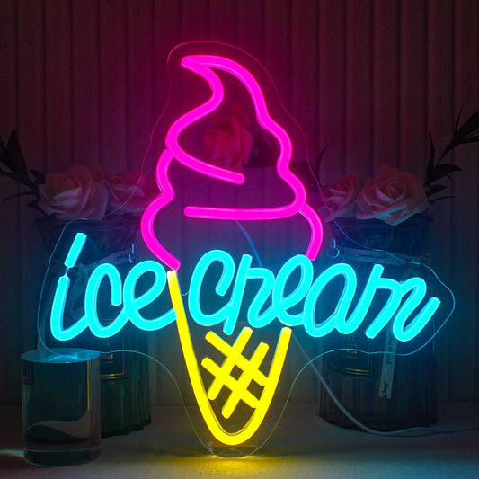 The image displays a vibrant, handmade LED neon sign in the shape of an ice cream cone.