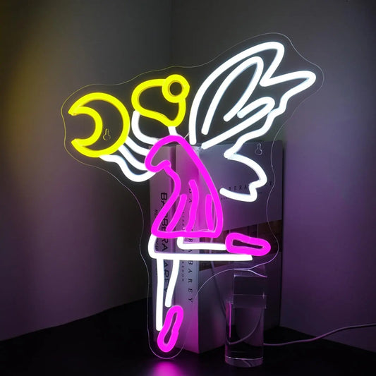 A glowing LED neon sign depicting a whimsical fairy with delicate wings, gracefully flying near a crescent moon.