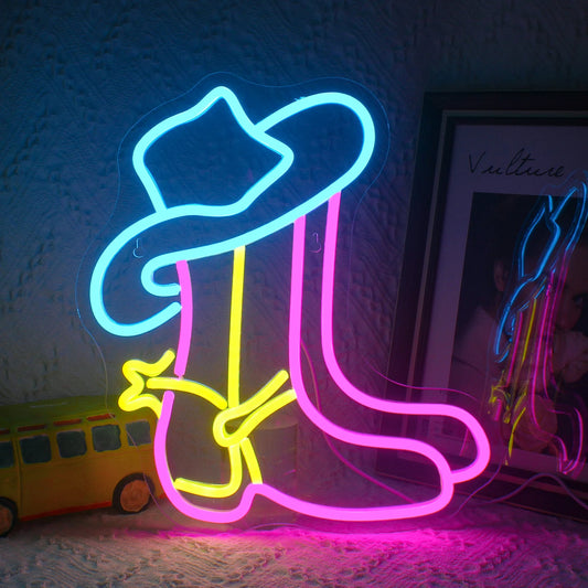 The image features a Cowboy Boot LED Neon Sign, showcasing a vibrant, glowing outline of a classic cowboy boot.
