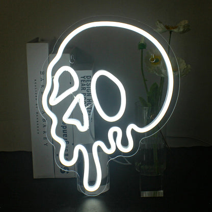The image features a vibrant Halloween-themed LED neon sign.