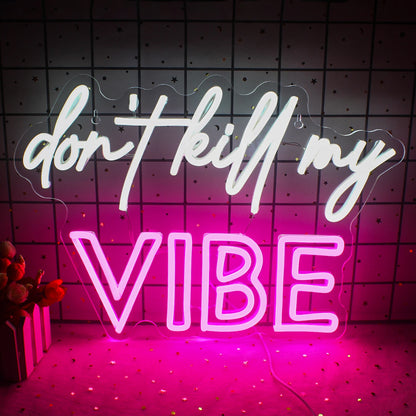 The image features a vibrant LED neon sign displaying the phrase "Don't Kill My Vibe" in a stylish cursive font.
