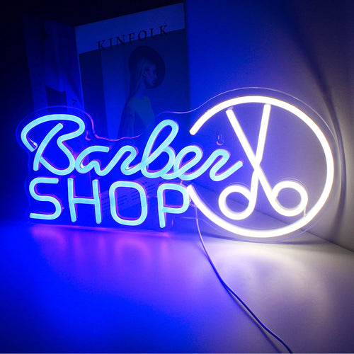 Uma vibrante placa de LED neon exibindo a palavra "Barbearia" em letra cursiva, iluminada em branco brilhante.