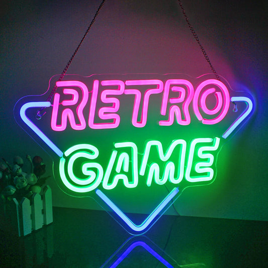 The image features a retro game-themed LED neon sign that beautifully illuminates in vibrant colors.