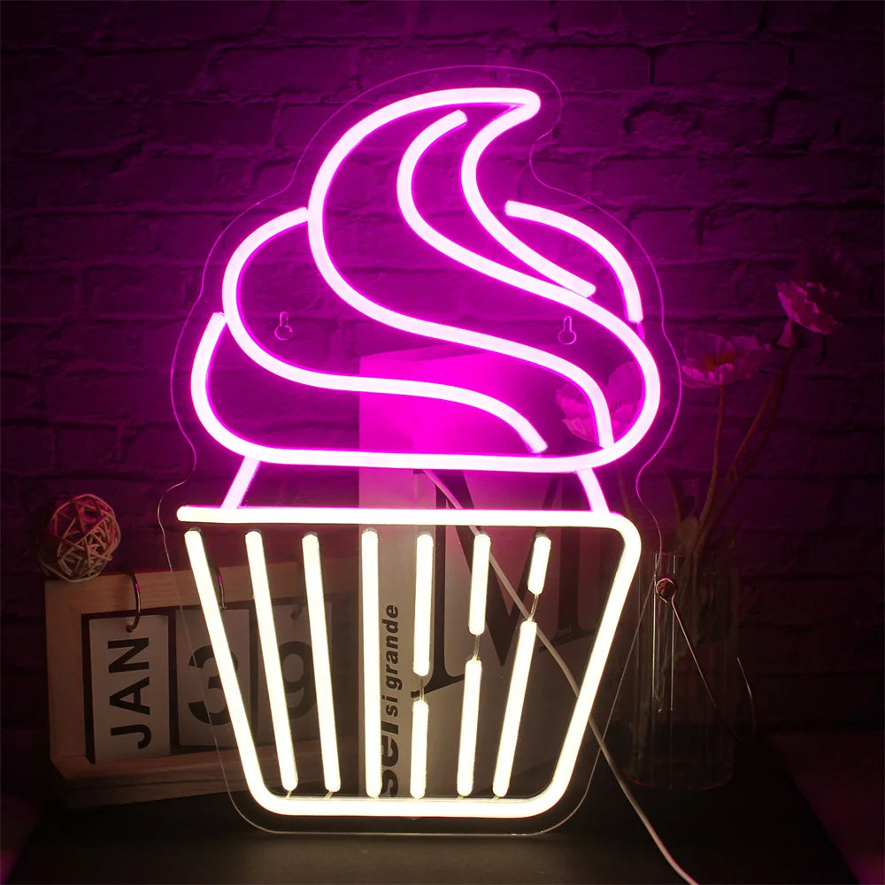 Um letreiro de LED neon vibrante no formato de um cupcake, com uma cobertura rosa espiralada coberta com uma pequena cereja vermelha.