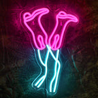 The image features a vibrant LED neon sign shaped like a cowboy boot.