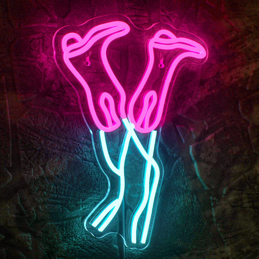 The image features a vibrant LED neon sign shaped like a cowboy boot.