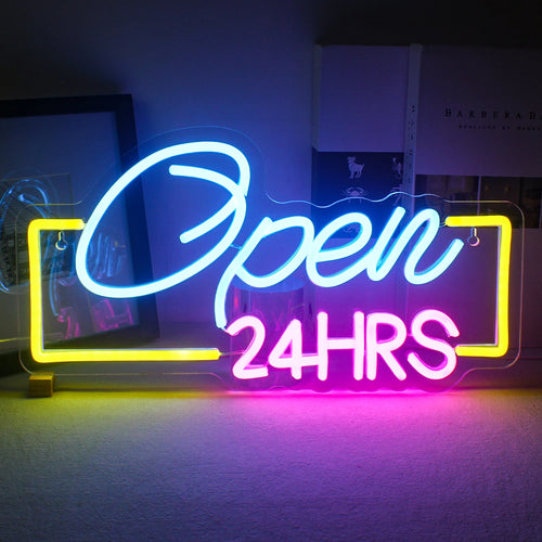 A imagem exibe um letreiro de LED neon vibrante no formato das palavras "Aberto 24 horas".