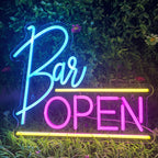 A imagem exibe uma placa de LED neon vibrante que diz "Bar aberto".