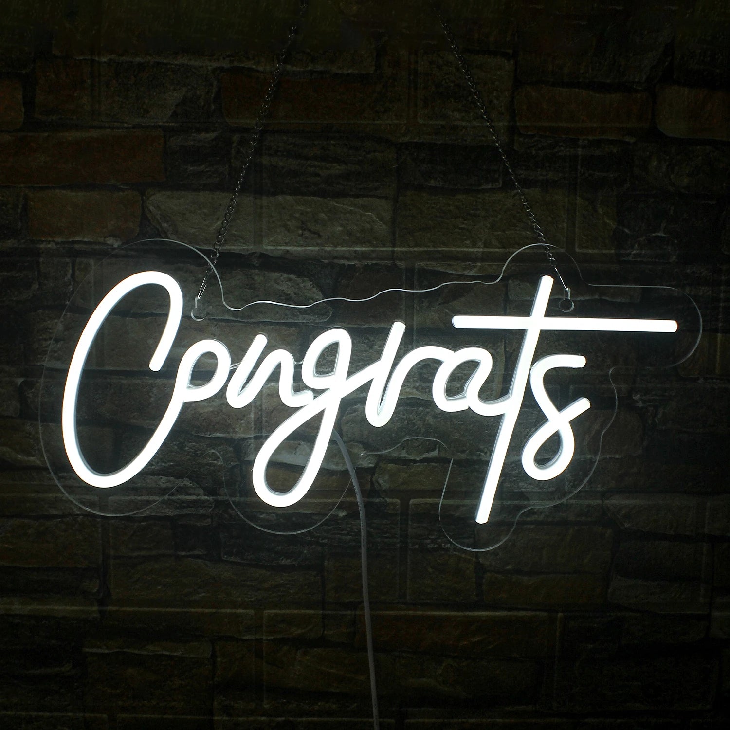 The image features a handmade LED neon sign displaying the word "Congrats" in a stylish, flowing script.