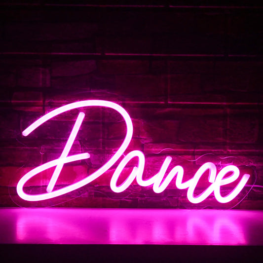 The image showcases a vibrant LED neon sign that spells out the word "Dance" in lively, cursive script.