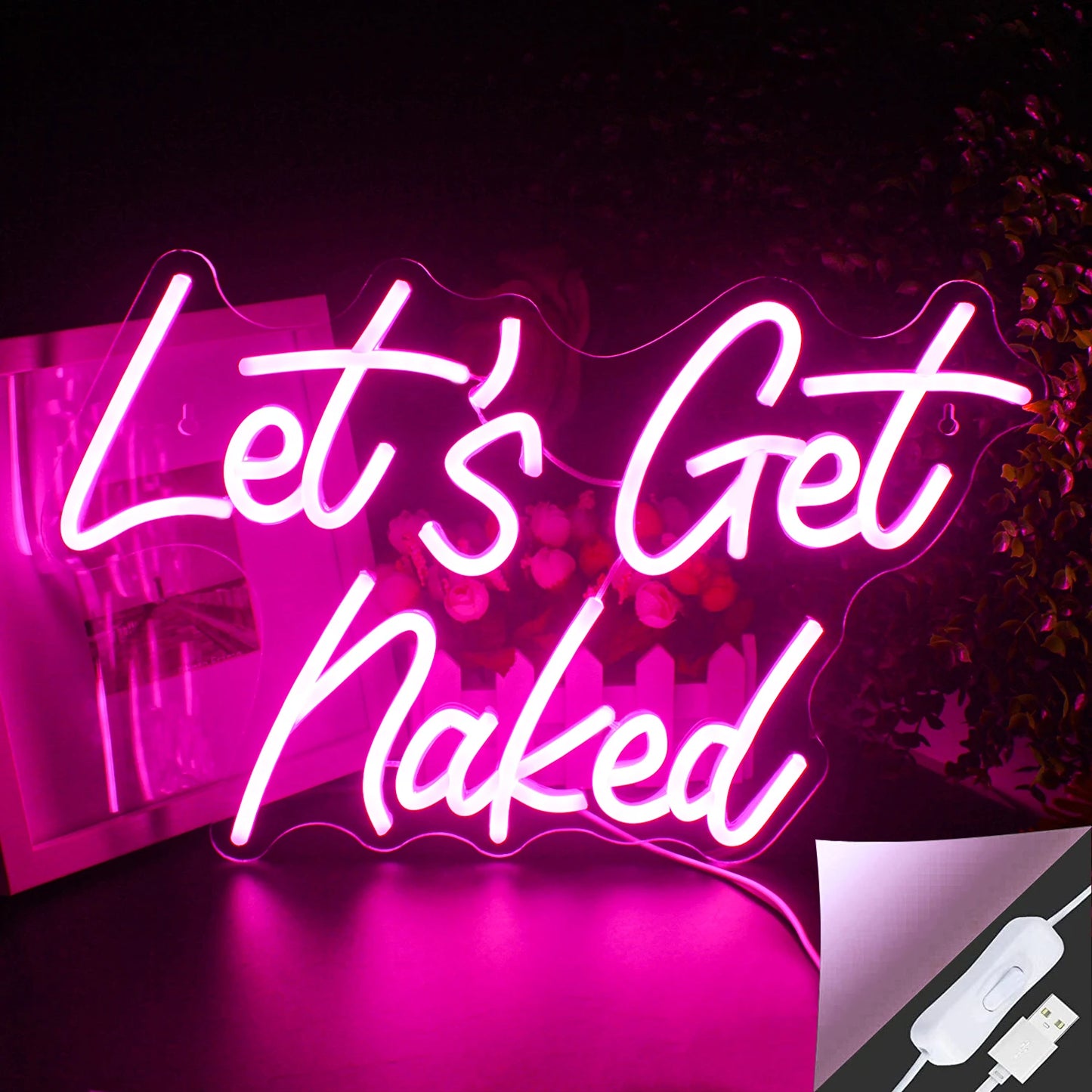 The image features a vibrant LED neon sign displaying the phrase "Let's Get Naked" in a stylish script font.