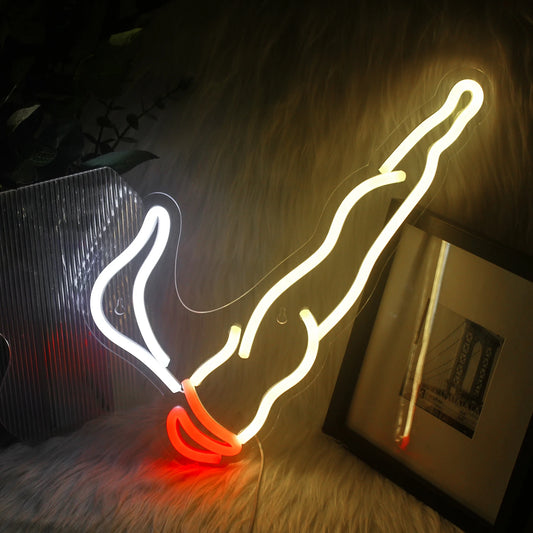 A vibrant LED neon sign depicting the word "Smoking" in bold, flowing cursive letters.