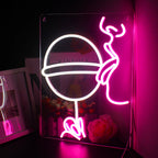 Uma vibrante placa de LED neon feita à mão com a palavra "Festa" escrita em letras cursivas.