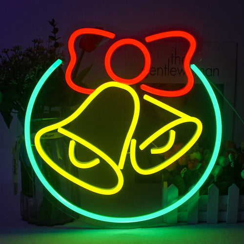 A imagem apresenta um letreiro de LED neon vibrante no formato de um sino clássico, frequentemente associado às festividades de Natal.